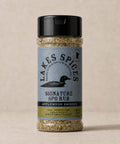 A 6oz bottle of Lake Spices Applewood Smoked Signature SPG Rub, featuring the company logo of a black loon on a blue-grey background, and a black icon of Minnesota in the upper righthand corner. Label text above the loon reads “Lake Spices: Honest Blends for Homemade Taste.”

Ingredients: salt, pepper, and garlic with a subtle smoky flavor
